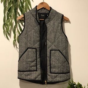 Black and white striped vest with gold zipper!